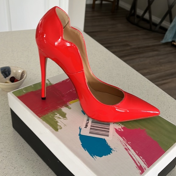 Beautiful red heels never worn. They are gorgeous - Picture 2 of 2
